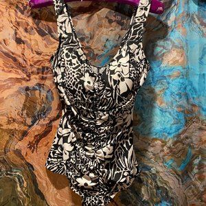 Brand new swimming suit!   It's an XL size, and I generally wear a 12.